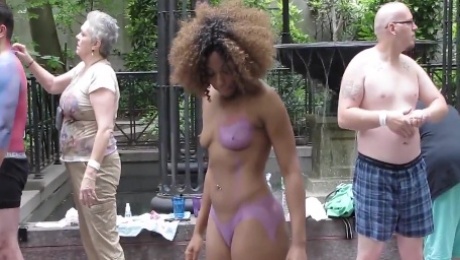 Ebony body paint nude in public