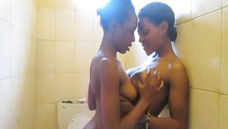 African Cuties Eating Pussy and Fingering in Shower