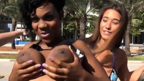 Sexy women in bikini flashed nice boobs for some money