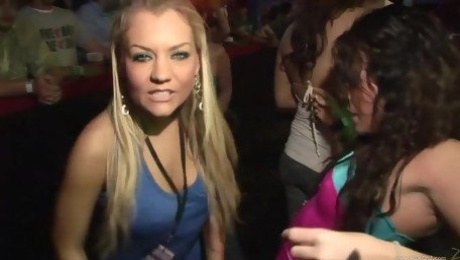 A fewy chicks flash their twats and tits in a club