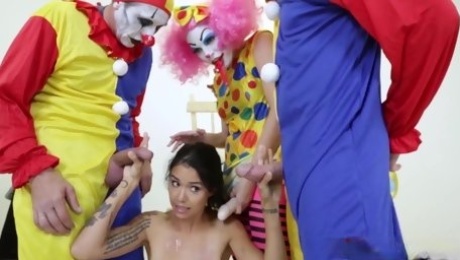 Clowns Penis-wises Play With a Brunette Chick Inserting Their Cocks in Her Holes in a Dirty Cosplay