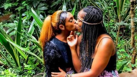 African festival outdoor lesbian make-out
